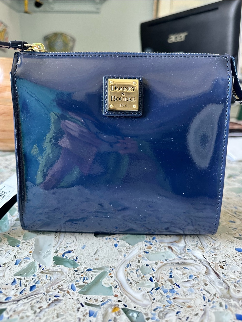 Dooney & Bourke North-South Janine Patent Crossbody Pouch in Indigo Blue